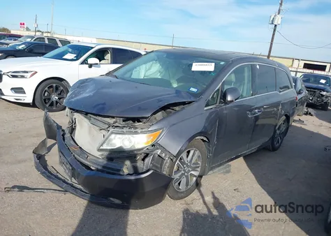 2014 Honda Odyssey Touring/Touring Elite из США, поврежденный, VIN 5FNRL5H96EB011561